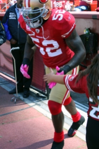NFL All-Pro LB Patrick Willis sports his pink gloves and cleats